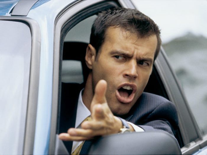 EXASPERATED MAN IN HIS CAR Original Filename: 10135102.jpg