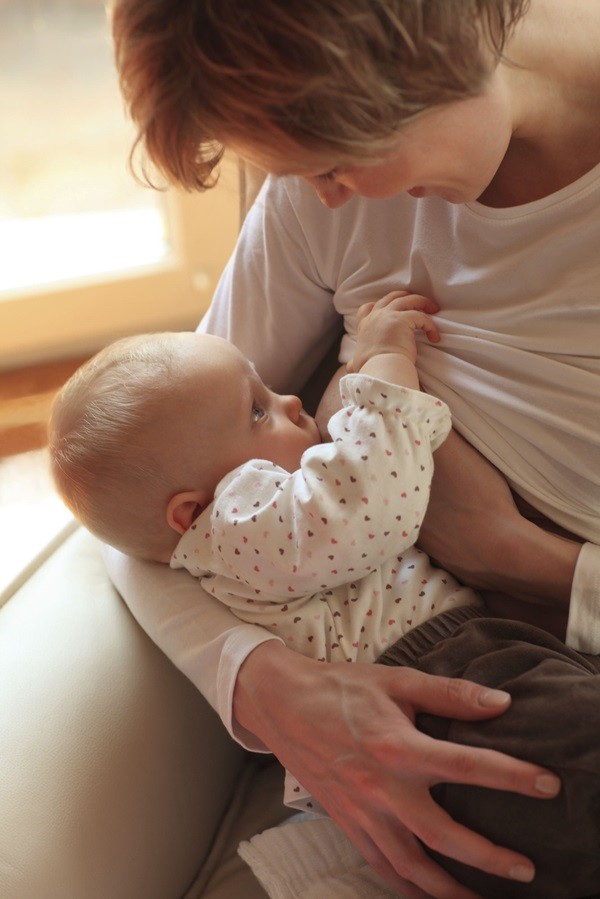mother breastfeeding baby
